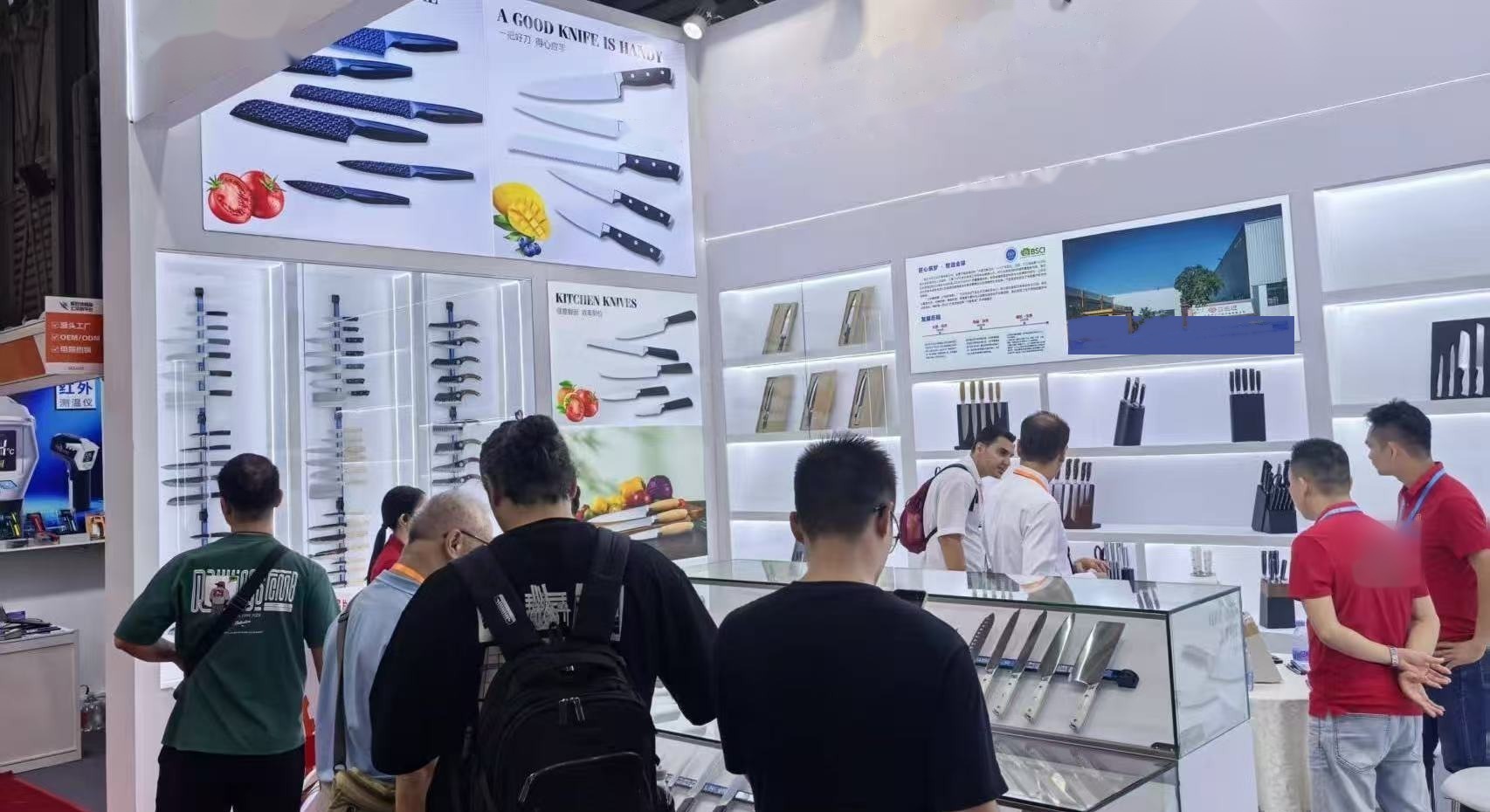 Partner factory booth at a knife fair, full range on display