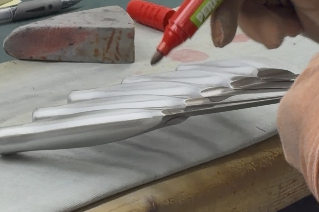 Finished knives checked and marked before packing