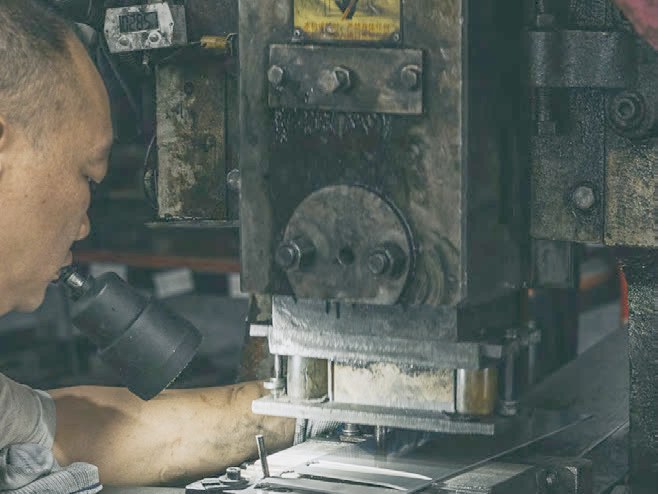 Blanking: the press cuts each blade profile from steel sheet